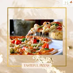 A delicious glimpse of our live pizza station, a favorite at both corporate events and family parties. We serve hot, cheesy, and flavorful vegetarian and Jain pizzas made right in front of your guests.