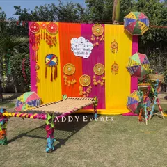 A traditional and colorful photo booth created for a Holi celebration. Featuring a charpai (woven cot), bright drapes, and festive hangings, this setup provides a perfect, on-theme spot for employees to take memorable photos.