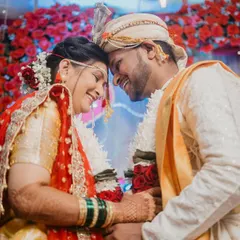 A quiet moment of connection between the bride and groom. We focus on capturing these unscripted, intimate exchanges that truly define the love you share on your wedding day.