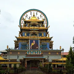 The stunning Golden Temple at the Namdroling Monastery in Bylakuppe, a peaceful and culturally rich place we visit during our Coorg exploration.