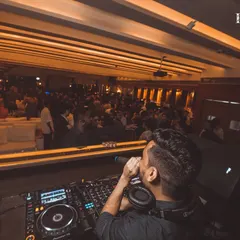 Grabbing the mic to hype up the crowd is a key part of my performance style. It helps build a direct connection and boosts the party atmosphere.