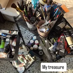 This is my treasure. My collection of paints, brushes, and tools is where every piece of art begins. It’s a beautifully chaotic mix of potential and creativity waiting to happen.