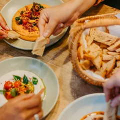 Our small plates are made for sharing. I love seeing hands reach across the table, dipping into creamy hummus and flavourful spreads. It’s how food should be enjoyed: together.