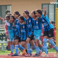 Pure joy and teamwork from our girls' team after a great play. We are committed to providing a supportive and empowering environment for female footballers to thrive and compete at the highest level.
