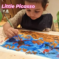 Look at the concentration on this little artist's face. In our kids' classes, we encourage exploration with different mediums, like this vibrant underwater scene created with bold brush strokes and a lot of imagination.
