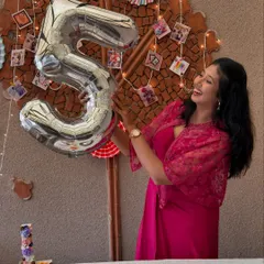 A candid moment of pure happiness during my 5th-anniversary celebration. This journey has been filled with so much love and creativity, and I can't wait for the next chapter.