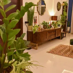A little peek into my happy space. This living room corner is filled with beautiful greens that I love. Welcome to my home!