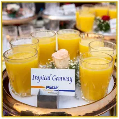 Escape to paradise with our "Tropical Getaway" mocktail. This sunny yellow drink is a sweet and refreshing blend of exotic fruit flavors.