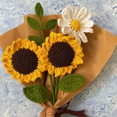 This custom bouquet combines two of my most requested flowers: cheerful sunflowers and a classic white daisy. It's a beautiful, handcrafted arrangement that brings together different textures and styles.