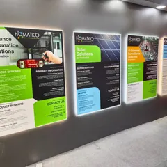 Our informational posters on display, detailing the benefits and services for Entrance Automation, Solar Solutions, and AI-Powered Surveillance. We believe in providing clear, factual information to our clients.