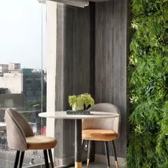 Our new office project is all about clean tones with a natural appeal. This seating nook by the window, complete with a living green wall, embraces a modern work environment that is both professional and refreshing.