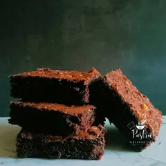 My classic chocolate walnut brownies have that perfect crinkly top and a rich, gooey center. They are incredibly fudgy and packed with crunchy walnuts.