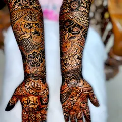 The beautiful dark stain of my organic henna paste, 48 hours after application. This full-arm bridal design shows the rich, deep color you can achieve with proper aftercare.