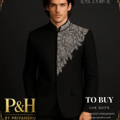 A closer view of the black Jodhpuri suit, highlighting the intricate details of the silver hand-embroidery and the sharp tailoring of the bandhgala collar.