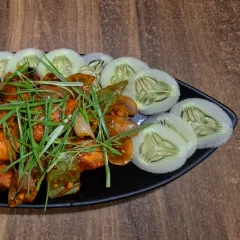 Our delicious Chicken Dry Fry made with fiery king chilli. It's a spicy and flavourful starter, perfect to kickstart your meal.