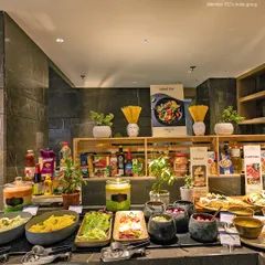 The salad bar at our breakfast buffet is stocked with fresh greens, vegetables, cheeses, and various dressings so you can build your own healthy creation.