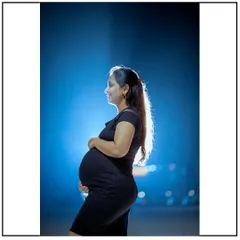 A striking solo portrait at night. The dramatic backlighting highlights your beautiful silhouette against the dark sky, creating a truly artistic and memorable photo.