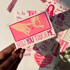 This page says "How You Touch Me," with a delicate drawing of two hands. The whole book follows this romantic, pink aesthetic.