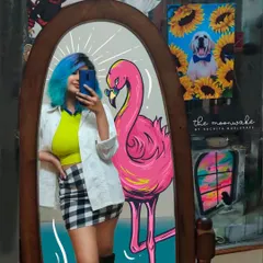 A mirror selfie with a surprise guest. I doodled this funky pink flamingo right onto the photo to create a surreal, playful moment.
