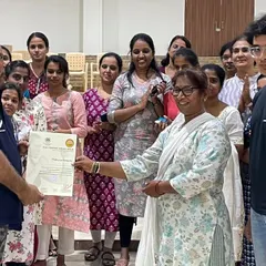 Presenting a certificate of appreciation to the organizers at the medical college. My goal is to make these essential safety skills accessible to as many communities as possible.