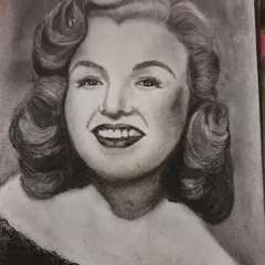 This is a finished charcoal portrait of the classic Hollywood icon, Marilyn Monroe. We often study famous faces in my workshops to master capturing recognizable features and glamorous expressions.