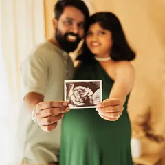 The very first portrait. Holding up your sonogram picture is a beautiful way to include your baby in the maternity session and celebrate this milestone.