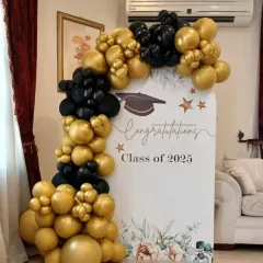 This setup is perfect for celebrating academic achievements, like for a graduation or a company intern's farewell. It features a custom printed backdrop for the "Class of 2025" framed by a classic black and gold balloon arrangement.
