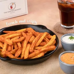 A bowl of our French and crispy Peri Peri Fries, seasoned generously and served with two dipping sauces. They are the perfect companion to any meal or a great snack on their own.