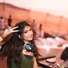 Peace, love, and beats. A happy moment captured during my sunset set at Elrow, Goa, with the beach party in full swing behind me.