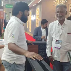 Sharing a positive discussion with a visitor at our booth. I enjoy connecting with people and helping them discover how smart automation can improve their daily lives.