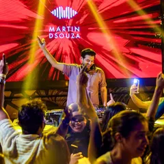 I balance the night between karaoke sets and straight-up dance music. This shot captures that moment where I switch gears to keep the dance floor full and the energy high.