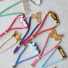 Another view of our modern and sleek acrylic Rakhis, available in a variety of colors and fonts to perfectly match your sibling's style.