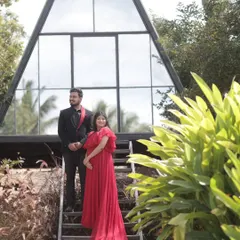 A change of outfit to a stunning red gown for a more dramatic look. The makeup was versatile enough to transition from the soft daytime look to this bolder evening style.