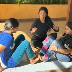 Guiding students in partner exercises helps them understand the mechanics of a pose. This interaction is from a workshop where we focused on using a partner's support to find stability and alignment.