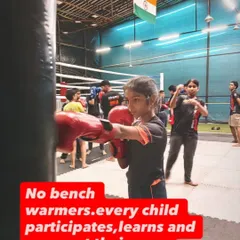Every child gets to participate and grow. This young boxer is focused on her technique with the punching bag, learning discipline and building confidence one punch at a time.