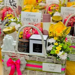 A vibrant and colourful Diwali hamper, this basket is filled with an assortment of treats, a small plant, and personalized tags. It’s a beautiful way to celebrate the festival of lights, curated to bring joy and prosperity.