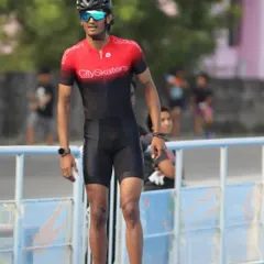 A portrait of champion speed skater Dhanush Babu in his racing gear. He has won 33 national gold medals and is ranked 5th in the world.