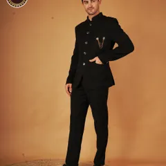The timeless charm of a Bandhgala suit is undeniable. This all-black ensemble is perfectly tailored for a sharp, sophisticated look, proving that elegance lies in simplicity and a perfect fit.