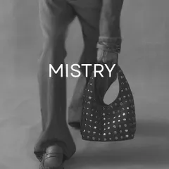 For the days you want to carry edge with ease. This shot captures the feeling of my studded accessories in motion, blending a modern vintage aesthetic with a minimalist style.