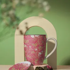 I love seeing my patterns on different products. Here, the 'Petal Pop' design adorns a beautiful mug, turning a simple object into a piece of floral art to brighten your morning coffee.