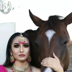 A close-up shot of a model in traditional Indian jewelry with her horse, perfect for bridal or ethnic wear photoshoots. My horses are calm and ideal for these intimate portraits.