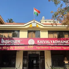 The facade of our Kaivalyadhama center in Mumbai, a landmark of authentic yoga education for 100 years. This is where tradition, science, and community come together.