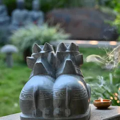This is our 'Jodi Nandi' or twin Nandi statue, a distinctive piece where two bulls are carved from a single block of stone, a true testament to our carvers' skill.