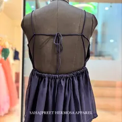 Introducing my signature PEECHA collection. This is a navy blue backless kurti with delicate spaghetti straps and a tie-up detail. It’s all about letting the back do the talking.