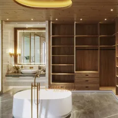 This unique bathroom combines a walk-in closet with a spa-like bathing area. The freestanding tub sits centrally, surrounded by warm wood paneling and grey marble floors.