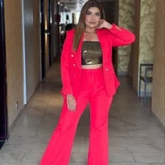 A full-length shot of my red power suit. This outfit makes me feel ready to conquer anything.