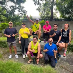 "Jab we met running!" A classic post-run group pose. We are a community of friends who found each other through our shared passion for running.