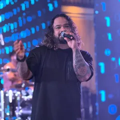 Our frontman engaging with the audience at the Tolani Maritime Institute alumni reunion. We make sure every corporate event feels like a personal concert.