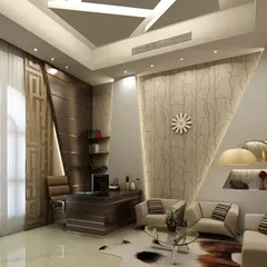 We used dramatic architectural elements, such as the angled feature wall with integrated lighting and a multi-level ceiling, to give this office a unique and dynamic feel. The design includes a dedicated seating area for informal client discussions within the private cabin.