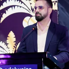 A close-up shot from the podium in Dubai. Clear and confident delivery is key, especially when addressing an international audience.